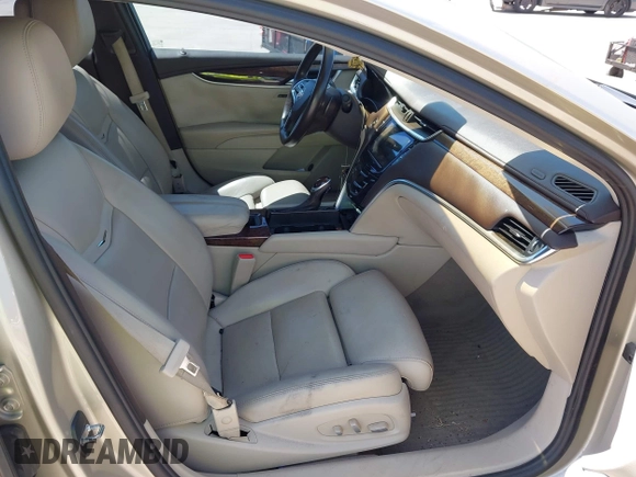 2014 Cadillac XTS Premium with VIN 2G61P5S33E9157607, listed as a IAAI auction lot 42004612 with 111,047 mi miles and . Bid and sale history available at DreamBid. Image 5.