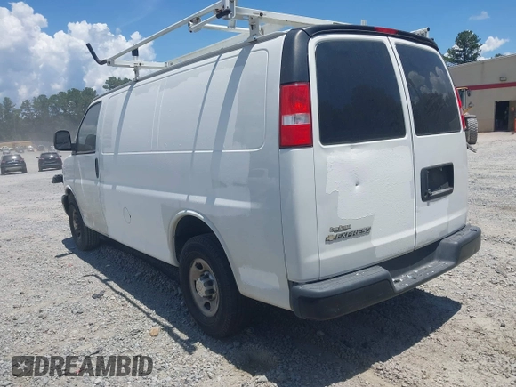 2020 Chevrolet Express Cargo with VIN 1GCWGAFG5L1119726, listed as a IAAI auction lot 42648575 with 127,516 mi miles and . Bid and sale history available at DreamBid. Image 3.