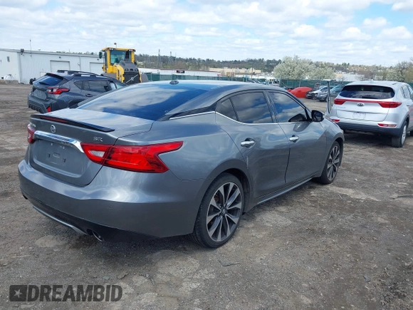 2016 Nissan Maxima SL with VIN 1N4AA6AP8GC385175, listed as a IAAI auction lot 41987763 with 117,485 mi miles and . Bid and sale history available at DreamBid. Image 4.