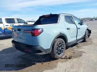 2023 Hyundai Santa Cruz SEL z VIN 5NTJC4AE4PH042943, wystawiony jako IAAI lot #41807647 z przebiegiem Nie podano mil oraz . Historia ofert i sprzedaży dostępna na DreamBid. Obrazek 4.