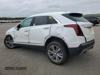 2024 Cadillac XT5 AWD Premium Luxury z VIN 1GYKNDRS9RZ736718, wystawiony jako Copart lot #56117375 z przebiegiem 9 147 mil mil oraz Szkoda całkowita • Salvage title. Historia ofert i sprzedaży dostępna na DreamBid. Obrazek 2.