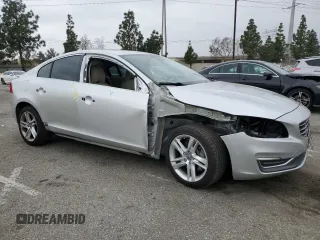 2014 Volvo S60 T5 with VIN YV1612FS4E1292856, listed as a Copart auction lot 50951795 with 121,283 mi miles and Salvage Title. Bid and sale history available at carsss.com. Image 4.