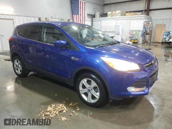 2016 Ford Escape SE with VIN 1FMCU9GX9GUC26772, listed as a Copart auction lot 45337945 with 112,822 mi miles and Salvage Title. Bid and sale history available at DreamBid. Image 4.