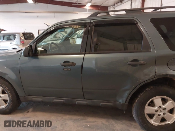 2012 Ford Escape XLT with VIN 1FMCU0D70CKC11664, listed as a IAAI auction lot 42280506 with 184,034 mi miles and . Bid and sale history available at DreamBid. Image 14.