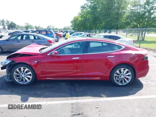 2016 Tesla Model S 90D z VIN 5YJSA1E4XGF171244, wystawiony jako IAAI lot #42584589 z przebiegiem 85 412 mil mil oraz . Historia ofert i sprzedaży dostępna na DreamBid. Obrazek 14.