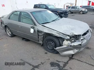1997 Toyota Camry LE z VIN JT2BG22K4V0078828, wystawiony jako IAAI lot #41828577 z przebiegiem 227 321 mil mil oraz . Historia ofert i sprzedaży dostępna na DreamBid. Obrazek 1.