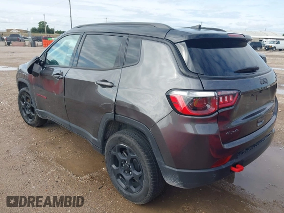 2023 Jeep Compass Trailhawk with VIN 3C4NJDDN9PT544283, listed as a IAAI auction lot 42393021 with 60,009 mi miles and . Bid and sale history available at DreamBid. Image 3.