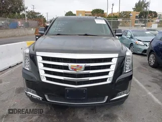2020 Cadillac Escalade ESV Luxury z VIN 1GYS4HKJ7LR116999, wystawiony jako IAAI lot #40707280 z przebiegiem 117 358 mil mil oraz . Historia ofert i sprzedaży dostępna na DreamBid. Obrazek 13.