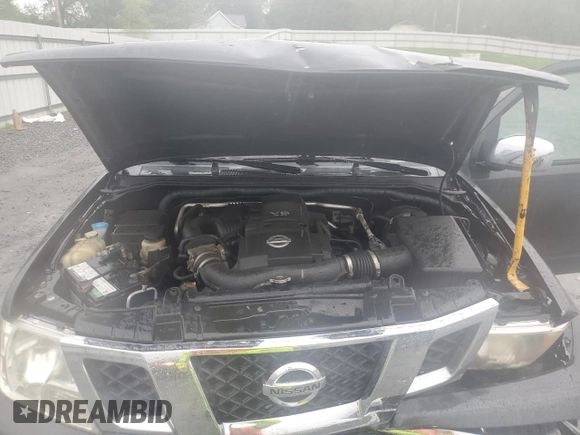 2010 Nissan Frontier SE with VIN 1N6AD0EV5AC407533, listed as a Copart auction lot 52020365 with 119,041 mi miles and Salvage title. Bid and sale history available at DreamBid. Image 11.