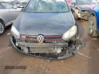 2010 Volkswagen GTI with VIN WVWHV7AJ5AW086277, listed as a IAAI auction lot 41753354 with 192,788 mi miles. Bid and sale history available at carsss.com. Image 6.
