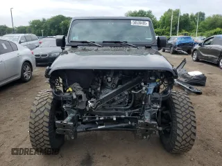 2022 Jeep Wrangler Unlimited Willys with VIN 1C4HJXDN4NW130060, listed as a Copart auction lot 58539485 with 39,930 mi miles and Salvage title. Bid and sale history available at DreamBid. Image 5.