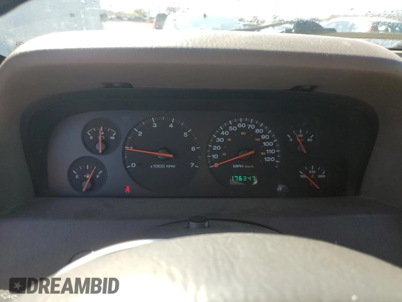 2000 Jeep Grand Cherokee Laredo z VIN 1J4GW48S8YC289367, wystawiony jako Copart lot #51378675 z przebiegiem 176 347 mil mil oraz Szkoda całkowita • Salvage title. Historia ofert i sprzedaży dostępna na DreamBid. Obrazek 9.