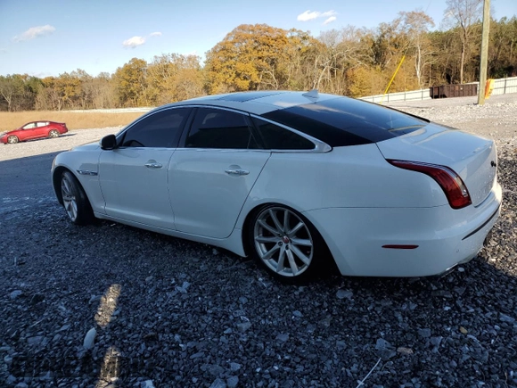 2014 Jaguar XJ with VIN SAJWA1CZ3E8V65747, listed as a Copart auction lot 81718664 with 87,846 mi miles and Clean Title. Bid and sale history available at DreamBid. Image 2.