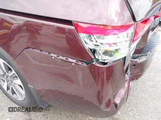 2014 Honda Odyssey Touring with VIN 5FNRL5H9XEB073156, listed as a IAAI auction lot 41990714 with 166,129 mi miles and . Bid and sale history available at DreamBid. Image 18.