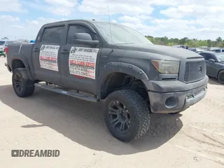 2013 Toyota Tundra 4WD Truck with VIN 5TFDW5F14DX279527, listed as a IAAI auction lot 41594899 with 212,973 mi miles. Bid and sale history available at carsss.com. Image 1.