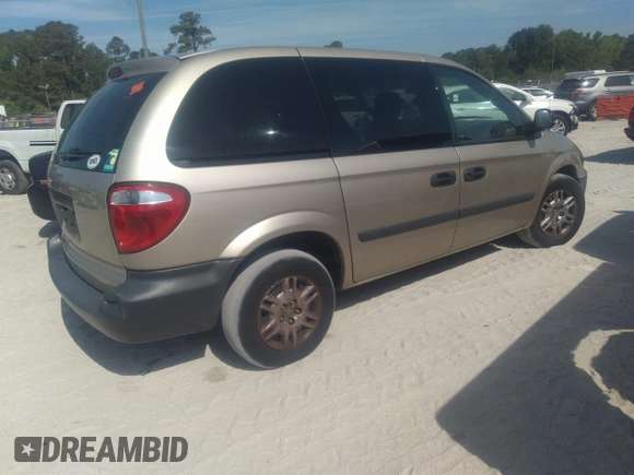 2005 Dodge Caravan SE with VIN 1D4GP25B25B410300, listed as a IAAI auction lot 42117541 with 34,596 mi miles and . Bid and sale history available at DreamBid. Image 4.