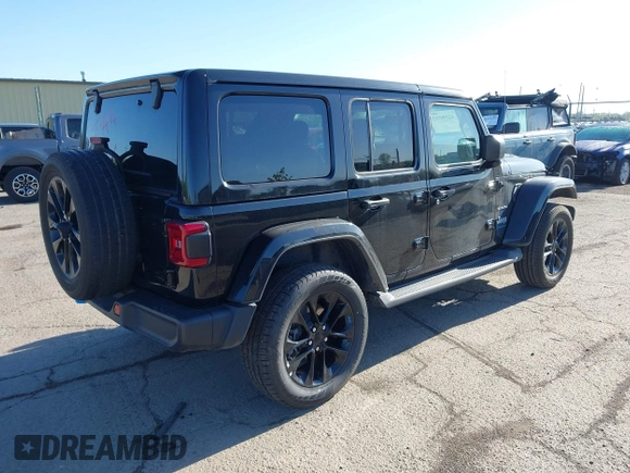 2023 Jeep Wrangler Sahara z VIN 1C4JJXP60PW627051, wystawiony jako IAAI lot #42290712 z przebiegiem 28 269 mil mil oraz . Historia ofert i sprzedaży dostępna na DreamBid. Obrazek 4.