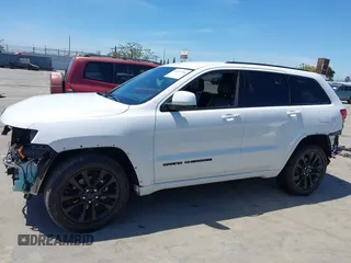 2018 Jeep Grand Cherokee Altitude with VIN 1C4RJEAG2JC404009, listed as a IAAI auction lot 42691304 with 60,948 mi miles and . Bid and sale history available at DreamBid. Image 15.