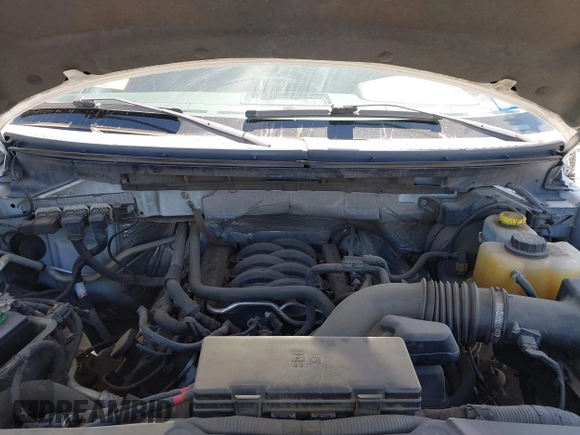 2014 Ford F-150 XL with VIN 1FTFW1EF4EKF03876, listed as a IAAI auction lot 41871706 with 151,642 mi miles. Bid and sale history available at carsss.com. Image 10.