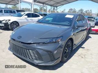 2025 Toyota Camry LE with VIN 4T1DAACK9SU070427, listed as a IAAI auction lot 41814689 with 2,934 mi miles and . Bid and sale history available at DreamBid. Image 2.