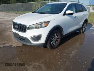 2017 Kia Sorento LX with VIN 5XYPG4A54HG217732, listed as a IAAI auction lot 42216032 with 157,243 mi miles and . Bid and sale history available at DreamBid. Image 2.