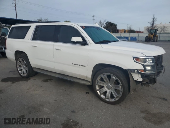 2015 Chevrolet Suburban LT with VIN 1GNSCJKC2FR601516, listed as a Copart auction lot 48480595 with 176,875 mi miles and Salvage title. Bid and sale history available at DreamBid. Image 4.