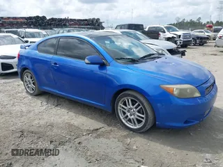 2006 Scion tC with VIN JTKDE167060132044, listed as a IAAI auction lot 41763063 with 256,479 mi miles. Bid and sale history available at carsss.com. Image 1.