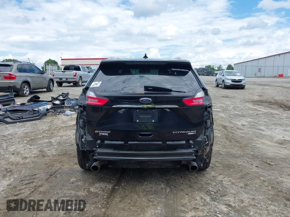 2020 Ford Edge Titanium z VIN 2FMPK4K90LBA55977, wystawiony jako IAAI lot #42257174 z przebiegiem 121 079 mil mil oraz . Historia ofert i sprzedaży dostępna na DreamBid. Obrazek 17.