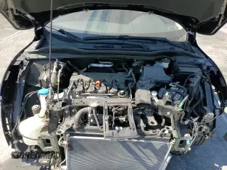2020 Honda HR-V LX z VIN 3CZRU5H38LG700009, wystawiony jako Copart lot #66958445 z przebiegiem 62 240 mil mil oraz Szkoda całkowita • Salvage title. Historia ofert i sprzedaży dostępna na DreamBid. Obrazek 14.