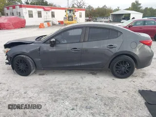 2015 Mazda 3 i SV with VIN JM1BM1T79F1246799, listed as a IAAI auction lot 41785860 with 109,760 mi miles. Bid and sale history available at carsss.com. Image 15.