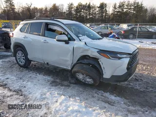2024 Toyota Corolla Cross LE with VIN 7MUBAABG0RV097884, listed as a IAAI auction lot 41447543 with 8,396 mi miles and . Bid and sale history available at DreamBid. Image 1.