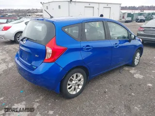 2015 Nissan Versa Note SV with VIN 3N1CE2CP4FL432933, listed as a IAAI auction lot 41741004 with 153,605 mi miles. Bid and sale history available at carsss.com. Image 4.