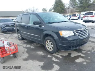 2010 Chrysler Town & Country Touring with VIN 2A4RR5D17AR293118, listed as a IAAI auction lot 41650474 with 136,969 mi miles. Bid and sale history available at carsss.com. Image 1.