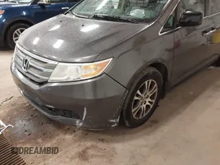 2011 Honda Odyssey EX-L with VIN 5FNRL5H67BB049446, listed as a IAAI auction lot 42116436 with 197,667 mi miles and . Bid and sale history available at carsss.com. Image 6.