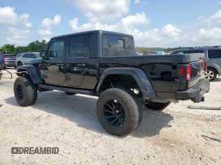 2021 Jeep Gladiator Freedom with VIN 1C6HJTAG8ML580882, listed as a Copart auction lot 57690885 with Not provided miles and Salvage title. Bid and sale history available at DreamBid. Image 2.