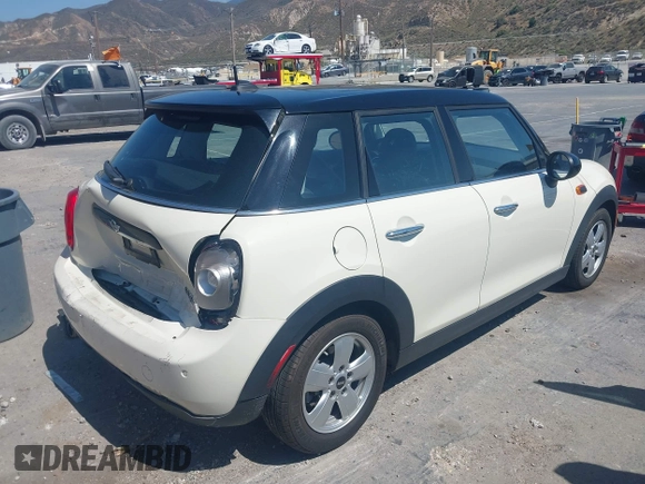 2016 MINI Hardtop 4 Door with VIN WMWXU1C56G2D10605, listed as a IAAI auction lot 42411431 with 35,367 mi miles and . Bid and sale history available at DreamBid. Image 4.