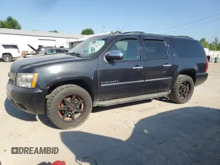2013 Chevrolet Suburban LTZ with VIN 1GNSKKE77DR145355, listed as a Copart auction lot 63591845 with 242,299 mi miles and Clean title. Bid and sale history available at DreamBid. Image 1.