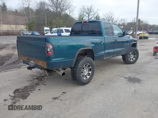1998 Dodge Dakota SLT with VIN 1B7GG22XXWS625292, listed as a IAAI auction lot 41704917 with 158,629 mi miles and . Bid and sale history available at carsss.com. Image 4.