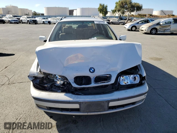 1999 BMW 5 Series 528iAt with VIN WBADP6330XBV61784, listed as a Copart auction lot 77685734 with 210,383 mi miles and Salvage Title. Bid and sale history available at carsss.com. Image 5.