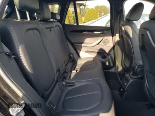2017 BMW X1 sDrive28i with VIN WBXHU7C30H5H33353, listed as a Copart auction lot 47473445 with 97,579 mi miles and Salvage Title. Bid and sale history available at carsss.com. Image 11.