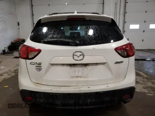 2014 Mazda CX-5 Grand Touring with VIN JM3KE4DY9E0343616, listed as a Copart auction lot 46427715 with 205,325 mi miles and Salvage Title. Bid and sale history available at carsss.com. Image 6.