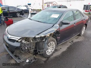 2013 Toyota Camry Hybrid LE with VIN 4T1BD1FK5DU083849, listed as a IAAI auction lot 40916318 with 204,058 mi miles. Bid and sale history available at carsss.com. Image 6.