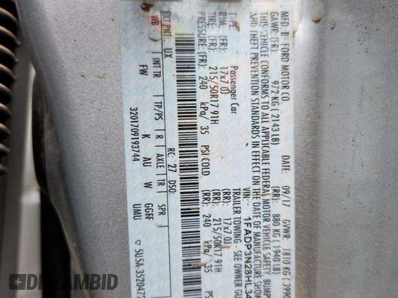 2017 Ford Focus Titanium with VIN 1FADP3N28HL346418, listed as a Copart auction lot 63507125 with 107,761 mi miles and Salvage title. Bid and sale history available at DreamBid. Image 14.