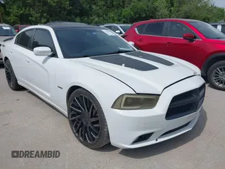 2013 Dodge Charger RT with VIN 2C3CDXCT1DH654737, listed as a IAAI auction lot 42069208 with 226,509 mi miles. Bid and sale history available at carsss.com. Image 1.