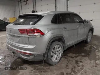 2021 Volkswagen Atlas SE z VIN 1V2HE2CA9MC219076, wystawiony jako IAAI lot #41608670 z przebiegiem 56 162 mil mil oraz . Historia ofert i sprzedaży dostępna na DreamBid. Obrazek 4.