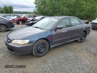 1999 Honda Accord LX with VIN JHMCG5643XC051077, listed as a Copart auction lot 62886635 with 252,941 mi miles and Salvage title. Bid and sale history available at DreamBid. Image 1.
