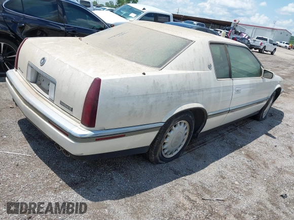 1994 Cadillac Eldorado ESC z VIN 1G6EL12Y4RU604343, wystawiony jako IAAI lot #42221885 z przebiegiem Nie podano mil oraz . Historia ofert i sprzedaży dostępna na DreamBid. Obrazek 4.