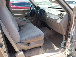 1997 Ford F-150 with VIN 1FTDX1769VNB04591, listed as a IAAI auction lot 42318471 with 202,860 mi miles and . Bid and sale history available at DreamBid. Image 5.