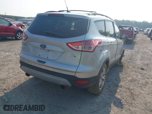 2014 Ford Escape SE with VIN 1FMCU9G96EUB25154, listed as a IAAI auction lot 42417612 with 176,916 mi miles and . Bid and sale history available at DreamBid. Image 4.
