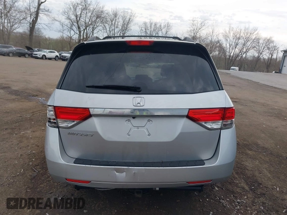2014 Honda Odyssey EX-L with VIN 5FNRL5H65EB096544, listed as a IAAI auction lot 41903451 with 99,628 mi miles and . Bid and sale history available at carsss.com. Image 16.
